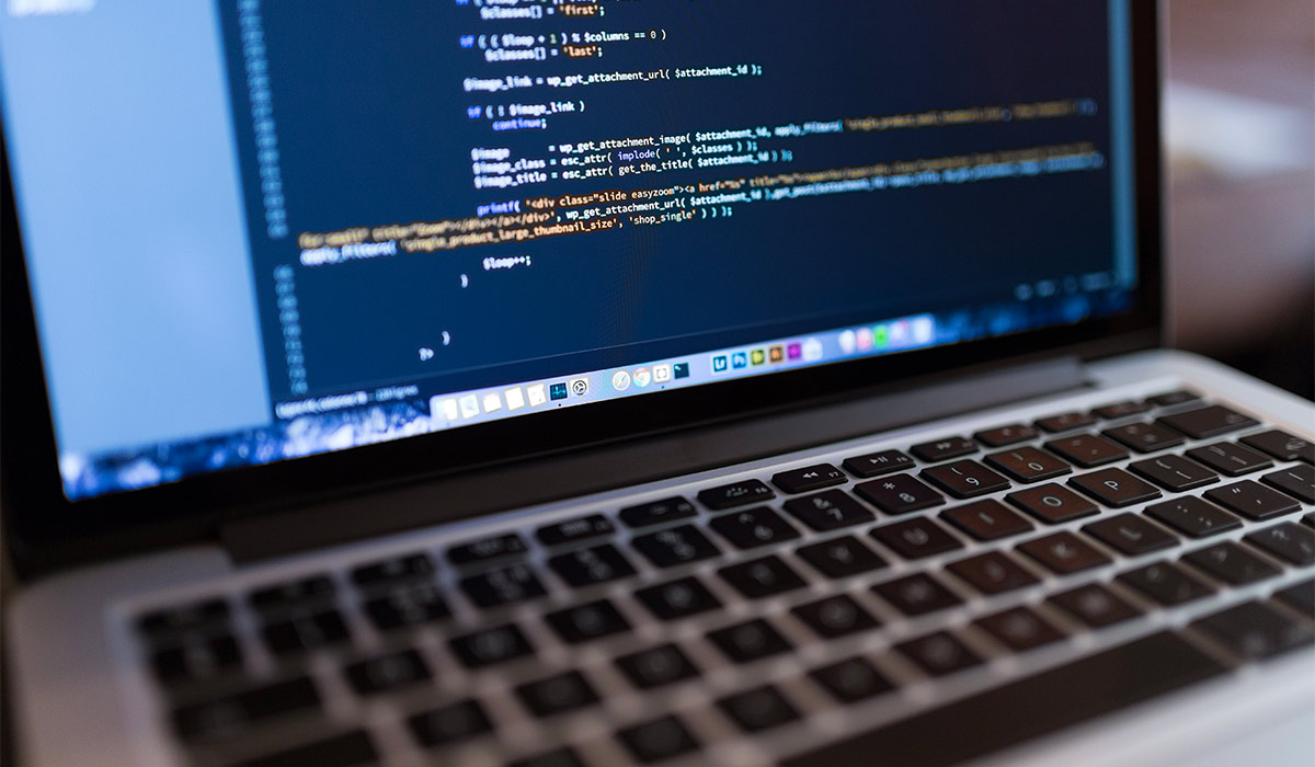 An image of code on a laptop